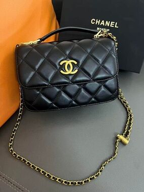 CHANEL Black Quilted Leather Crossbody with Gold Chain Strap